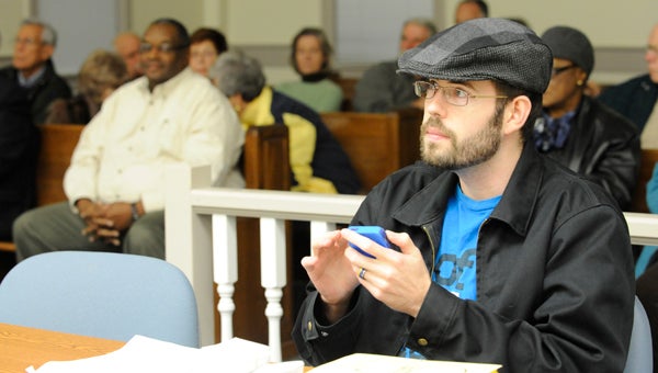 VAIL STEWART RUMLEY | DAILY NEWS  BEFORE THE POLLS: Jake Geller-Goad, Democracy NC’s eastern North Carolina field organizer waits to be introduced. Geller-Goad spoke about voting changes that will affect all North Carolina residents in the upcoming election.