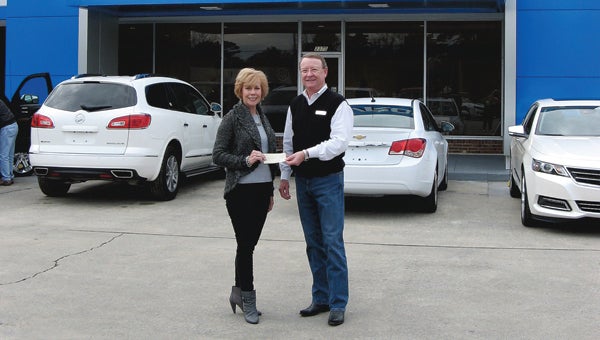 DEBBIE ADAMS | CONTRIBUTED STAR SEARCH:  Steve Lee, with Lee Chevrolet Buick, presents a donation to Debbie Adams, interim executive director of Eagle's Wings. The money is designated for the prize money and startup costs for the East Carolina Star Search Fundraiser at the Turnage Theater to benefit the Eagle's Wings Food Pantry. Read more about the fundraiser at www.ecstarsearch.net. Email eastcarolinastarsearch@gmail.com for an entry form and more information. 