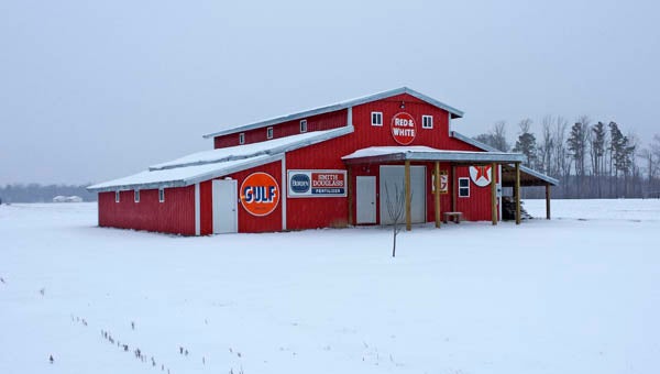 JAY SULLIVAN | CONTRIBUTED RED ON WHITE: Photographer Jay Sullivan captured this image of a red and white barn on Creek Road, Bath, during the latest round of snow Feb. 11. 