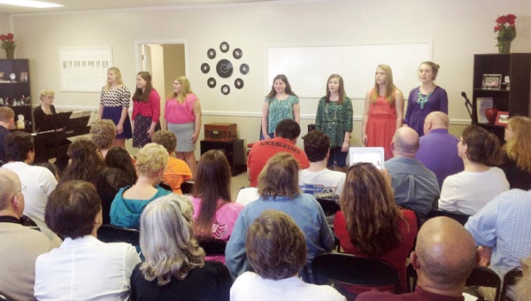 NEVA CASHION | CONTRIBUTED FROM THE HEART: Students at the Inner Banks Music Academy present a mini-recital to friends and family members at the academy’s studio.  