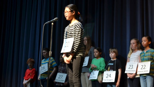 DAVID CUCCHIARA | DAILY NEWS C-H-A-M-P-I-O-N: Hope Middle School’s Lauren Lim, 14, locks up a spot in this year’s National Spelling Bee with the win on Saturday. 