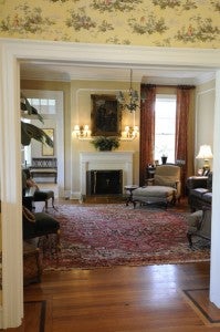 TIME WARP: Historical with a hint of contemporary, the family room at the Spruill home is warm and inviting.