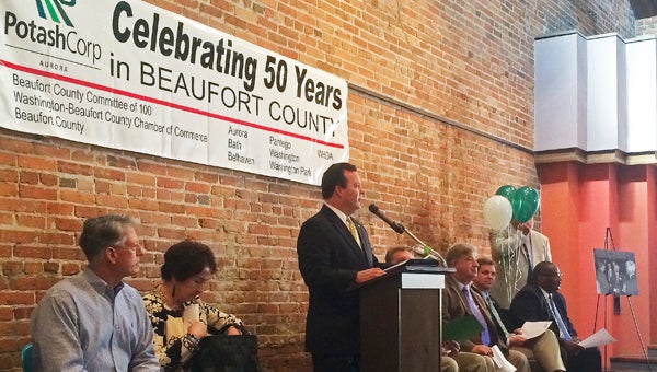  JONATHAN ROWE | DAILY NEWS MILESTONE: On Thursday, a celebration of PotashCorp-Aurora’s 50th anniversary was held at the Washington Civic Center. Pictured here is Ray McKeithan, public and governmental affairs manager of PotashCorp-Aurora, giving a speech at the celebration. 