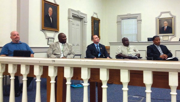 BEAUFORT COUNTY DEMOCRATIC PARTY | CONTRIBUTED DEMOCRATIC LINEUP: Democratic candidates for Beaufort County sheriff participated in a party forum Monday night at the Beaufort County courthouse. From left to right are Capt. Phillip Lee (representing Chocowinity Police Chief Todd Alligood, who could not attend), Val Scales, Capt. Russell Davenport, Gary Blount and Al J. Whitney. 