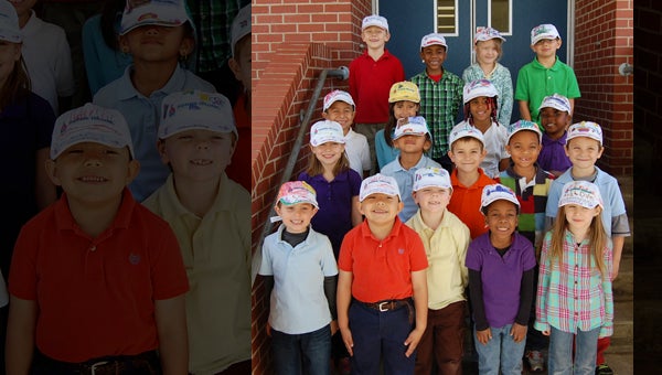 BEAUFORT COUNTY SCHOOLS | CONTRIBUTED CPS THINKING CAPS: These Chocowinity Primary School kindergarten students proudly wear their new "thinking caps" while taking a break from their studies. The local Sherwin-Williams paint store in Washington donated the caps to the class, and the students in turn added their own embellishments. 