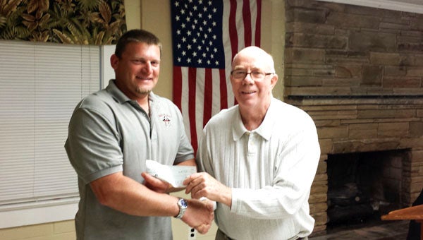 BATH RURITAN CLUB | CONTRIBUTED SPORTS FANS: John Everett, president of the Bath Ruritan Club, presents a $500 contribution to Chris Sauls, president of the Bath Recreation League, on April 7, 2014. 