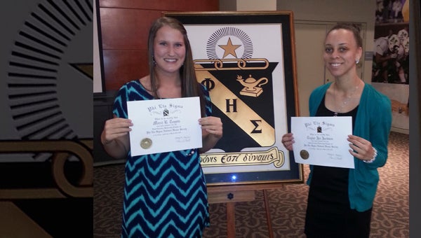 KIMBERLY JACKSON | CONTRIBUTED  FIRST FRESHMEN: Washington natives Marci Toppin (left) and Taylor Jackson (right) were recently inducted into East Carolina University’s Phi Eta Sigma National Honor Society. Marci is a 2013 graduate of Washington High School and Taylor is a 2013 graduate of Beaufort County Early College High School. Phi Eta Sigma Honor Society recognizes academic excellence by acknowledging first semester freshman students with a 3.5 grade point average or higher.  