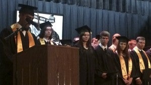 JONATHAN ROWE | DAILY NEWS CLASS: Ramon Perez Soto gave the invocation for Northside High School’s graduation on Tuesday night while his fellow classmates stood on-stage in front of friends, family and faculty. 