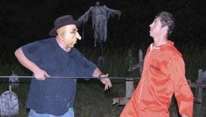 FRIGHT NIGHT: Thomas Wainwright (left) and Kobe Toften are among the ghouls waiting for guests along the Haunted Trail.