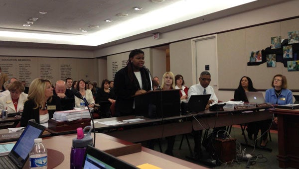 SOUTHSIDE HIGH SCHOOL | CONTRIBUTED PRESENTING THE FINDINGS: Pictured, Jamya Moore, a student from Southside High School, speaks to the State Board of Education at its December meeting. Moore and fellow classmate Madison Farmer-Cashion presented the lessons learned from a global poverty project conducted earlier in the semester. 