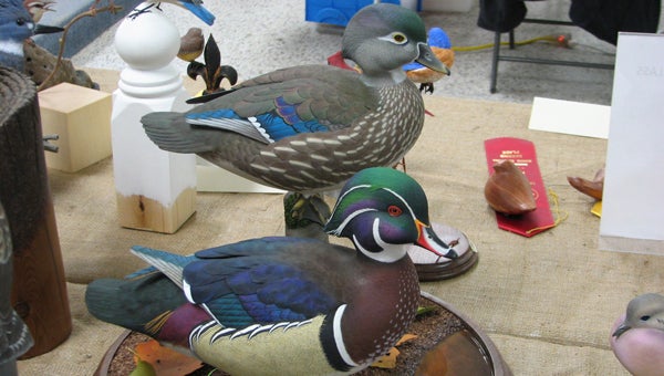 FILE PHOTO | DAILY NEWS  EXQUISITE EXAMPLES: These two carving provide proof of the quality of artwork found at the East Carolina Wildlife Arts Festival and North Carolina Decoy Carving Championships held annually in Washington.
