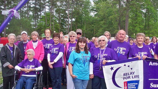 EDIE FINDLEY | CONTRIBUTED IN HONOR OF SURVIVORS: Union Chapel Free Will Baptist Church has participated in Beaufort County Relay For Life since its inception. Pictured, the church��s Relay team and other church members gear up for the Survivor Lap of Relay For Life.  