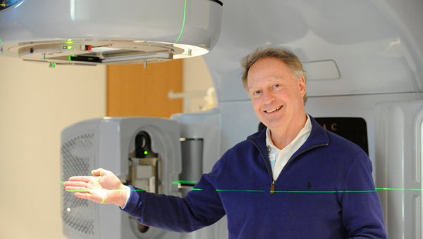 VAIL STEWART RUMLEY | DAILY NEWS IN THE SIGHTS: Director of Radiation Oncology Dr. Robert McLaurin Jr. displays the laser focusing ability of the new linear accelerator at the Marion L. Shepard Cancer Center. The state of the art technology means Washington’s center “has the best linear accelerator east of 95,” according to McLaurin. 