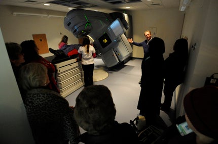TOUR GUIDE: Dr. Bob McLaurin, director of radiation oncology at the Marion Shepard Cancer Center, describes the workings of the center’s linear accelerator to Vidant-Beaufort Hospital staff.