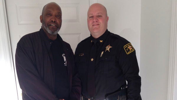 EDYTHE WILLIAMS COMMUNITY LEADERS: Pictured are Artis Williams, a retired deputy with the Beaufort County Sheriff’s Office and member of St. Peter’s Baptist Church, and Chief Deputy Charlie Rose with the BCSO, both of which attended a forum at the church that brought community members and local law enforcement agencies together. 