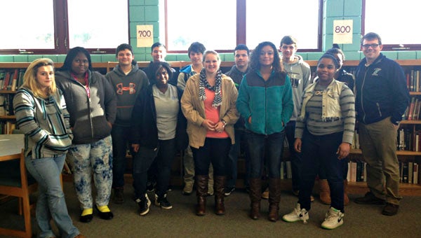 SOUTHSIDE HIGH SCHOOL GOOD CHARACTER: Congratulations to the following Southside High School students for receiving the Character Education Trait Awards during the months of December and January: Pictured (left to right, back row), Teisha Scanell, Roberta Williams, Brandon Edwards, Joe Anderson, Raymond Torres, Troy Keyes, Jarret Nobles, Dajea Reddick, Dale Cole (Principal), (left to right, front row) Ta'Shera Johnson, Jasmin Ayers, Destiney Boyd and Takeiyah Roberson. Teachers nominate students to receive the Character Education Trait Awards based on positive character and personality traits they observe throughout the month. Way to go, Seahawks. 