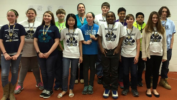 NORTHEAST ELEMENTARY SCHOOL ON THE SAME PAGE: The Northeast Elementary Middle School Battle of the Books team won the Beaufort County Schools Battle of the Books competition on March 17. They will now travel to Elizabeth City to compete in the regional competition on April 14. Participants include (front row from left to right) Reagan Dana, Kaylee Cahoon, Tracy Dong, Bailey Dana, Fred Taylor, Jacob Van Gyzen and Rachael Daleo; (back row)  Layla Brock, Matthew Cullom, Ms. Dorothy Black, Chase Smith, Ronnie Winfield, Randy Mendoza-Segura(alternate) and Frankie Pagliero (alternate)​.