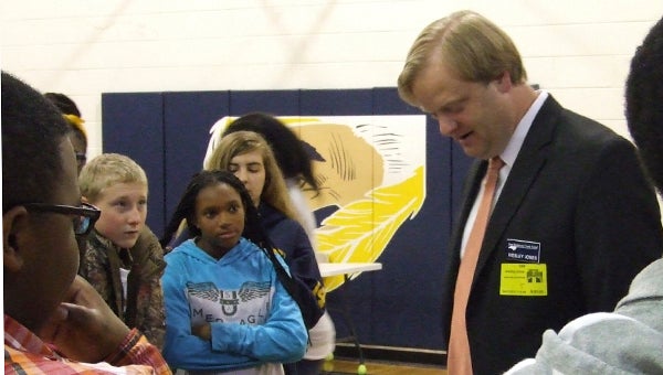 CHOCOWINITY MIDDLE SCHOOL BANKING 101: At Chocowinity Middle School’s Career Fair, Wesley Jones, branch manager at State Employees Credit Union, talked to eighth-grade students about his work at the bank. 
