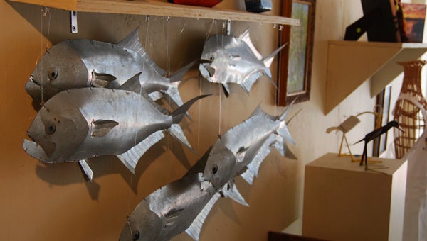 Kevin Scott Cutler | Daily News SCULPTURES: A school of fish sculptures by Wilmington artist Michael Van Hout adorn the BCAC gallery. 