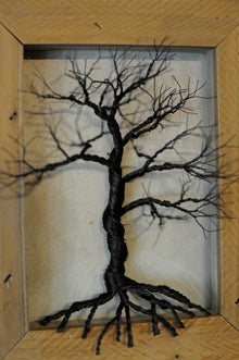 VAIL STEWART RUMLEY | DAILY NEWS WIRE TREE: This mixed media piece of Little Art consists of wire and wood on canvas and is just one of many submissions to the Beaufort County Arts Council fundraiser. 