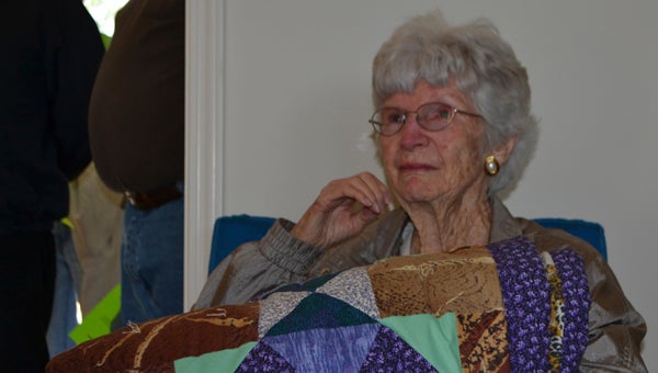 JONATHAN ROWE | DAILY NEWS PREPARING A PLACE: Through the work of United Methodist Disaster Recovery ministry, Chocowinity woman Louise Hill (pictured), whose home fell victim to last year’s April 25 tornadoes, celebrated the blessing of her new home Friday.