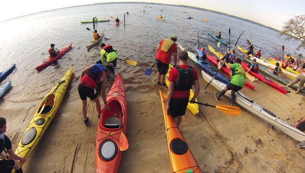ASHLEY VANSANT | DAILY NEWS ON YOUR MARK: Racers in the Kayakalon Race for the River prepare to head out on the Pamlico River at Goose Creek State Park. The popular race is open to participants ages 12 and up. 