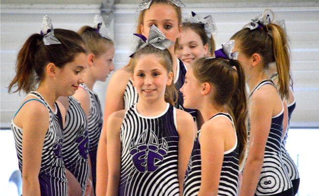 DAVID CUCCHIARA | DAILY NEWS MOVING FOWARD: Fifth grader Katie Council leads her team, the Leopards, through a routine back in March.