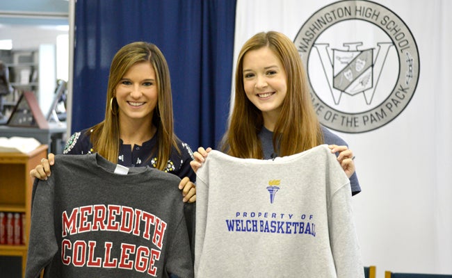 DAVID CUCCHIARA | DAILY NEWS NEXT LEVEL: Washington soccer player Warner Little (left) and volleyball player Abby Walker (right) signed their letter of intent on Wednesday to play their respective sports at the collegiate level.