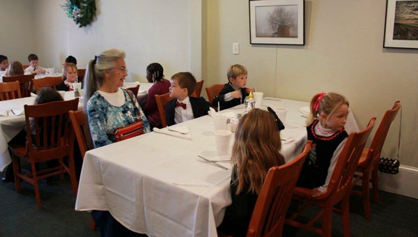 VIDANT BEAUFORT HOSPITAL MINDING MANNERS: Vidant Family Medicine-Belhaven recently made a donation to Northeast Elementary School for the kindergarten classes to go to a local restaurant for a table etiquette lesson. The children were encouraged to dress up in coats and ties and dresses for the meal. Fish Hooks Café in Belhaven hosted the students for this lesson. 