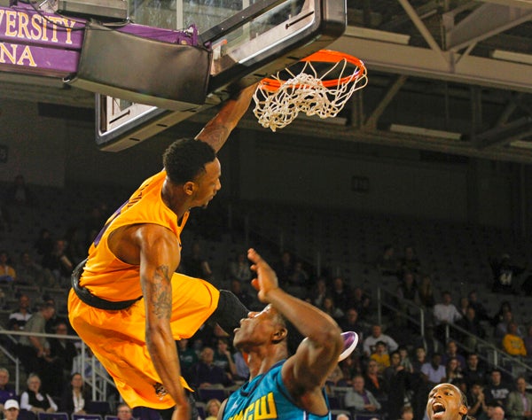 RONNIE MOORE | CONTRIBUTED POSTERIZATION: B.J. Tyson slams down a hard dunk against UNC-Wilmington on Wednesday night. Tyson had a game-high 21 points, making it his third game in a row at Minges Coliseum scoring at least 21. The Pirates improved to 6-0 at home with the win. 