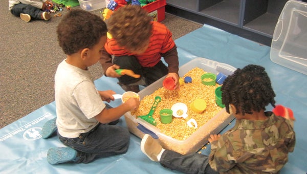 BEAUFORT-HYDE PARTNERSHIP FOR CHILDREN SOCIALIZATION: Children participating in Beaufort-Hyde Partnership for Children’s Pat-a-Cake Playgroups, interact with each other during free play, a time allotted for the building of socialization skills. 