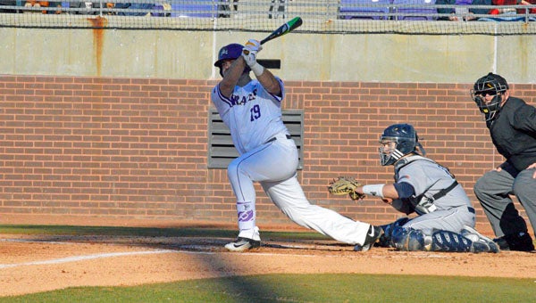 MICHAEL PRUNKA | DAILY NEWS SWINGING FOR THE FENCES: Travis Watkins takes a cut in ECU’s season opener against Longwood. He was 5-of-13 at the plate with a run and an RBI in the series at Virginia. 