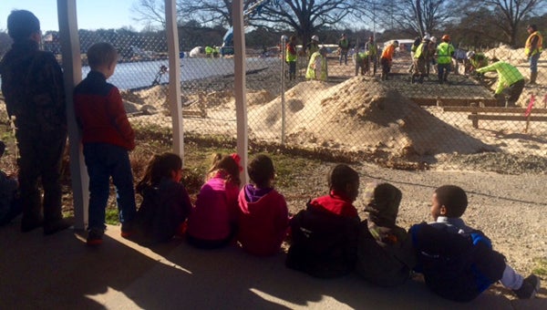EASTERN ELEMENTARY SCHOOL FIELD TRIP: Students from Lindsay Haddock's kindergarten class enjoyed a "field trip" down to the new multipurpose building at Eastern Elementary School. The students were able to see the changes in concrete from the pouring process to the finishing process. They were amazed at how quickly the concrete flowed from the truck and how smooth it became after the finishing process took place. 