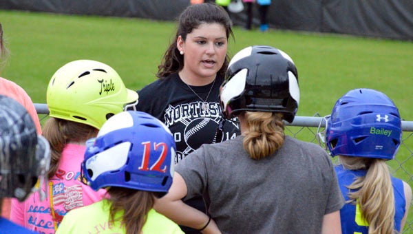 MICHAEL PRUNKA | DAILY NEWS TEACHING EXPERIENCE: Kendall Alligood gives directions to her group. The girls worked on everything from fielding to batting to conditioning.  