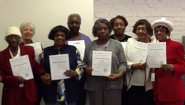 CYNTHIA HEATH SUPPORTING SCHOOLS: Twenty-two members of the Beaufort County Unit of the North Carolina Retired School Personnel were recently recognized for their volunteer service in 2015. Pictured (front row, left to right) are Delores Moore, Rosa Beamon, Jackie Garner, Cynthia Heath, Hattie Johnson, Emma Howard, (back row, left to right) Margaret Ann Woolard, Chris Davis and Delores Lee. 