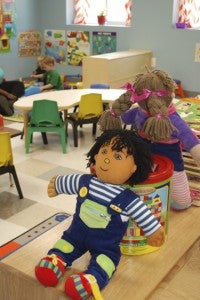 EDUCATIONAL PLAY: The 2-year-olds classroom comes alive with bright colors, age-appropriate toys and educational activities. Leggett said she is striving to strike a balance between work and play.