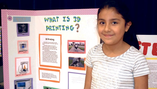 CAROLINE HUDSON | DAILY NEWS 3-D RESEARCH: Luna Espinoza, a fifth-grader, completed a research project on 3-D printing and was able to print objects as part of her project. 
