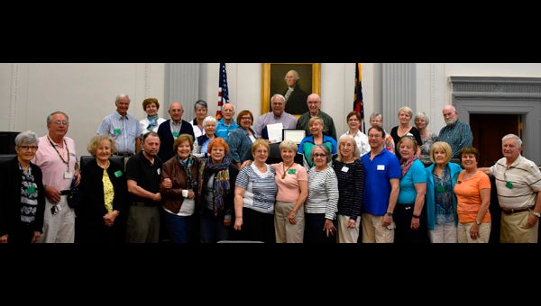 JAN HINDSLEY LIFELONG FRIENDS: Colonial Carolina Friendship Force, Washington’s charter, received members of its Ottawan counterpart this week. The local group coordinated activities for each day of the visit and showed them what life is like in Beaufort County. Pictured are members of both groups during a Thursday meeting with Washington Mayor Mac Hodges. 