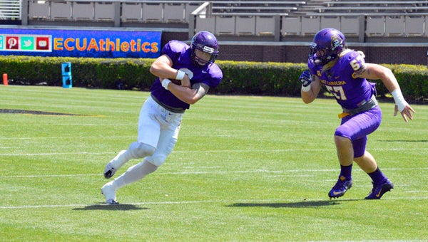 MICHAEL PRUNKA | DAILY NEWS SNEAK PLAY: Kurt Benkert runs a quarterback draw in ECU’s spring game a few weeks back. It was announced Monday that Benkert, who learned under former Pirate signal caller Shane Carden, would transfer from the program. 