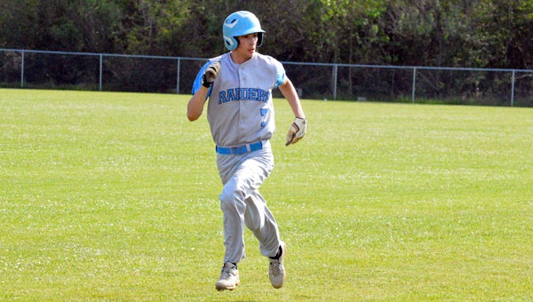 MICHAEL PRUNKA | DAILY NEWS MOVING FORWARD: Landon Woolard darts toward third base during Thursday’s clash with Terra Ceia. Pungo has lost two in a row for the first time this season, but the hope is that the Raiders can bounce back quickly. 