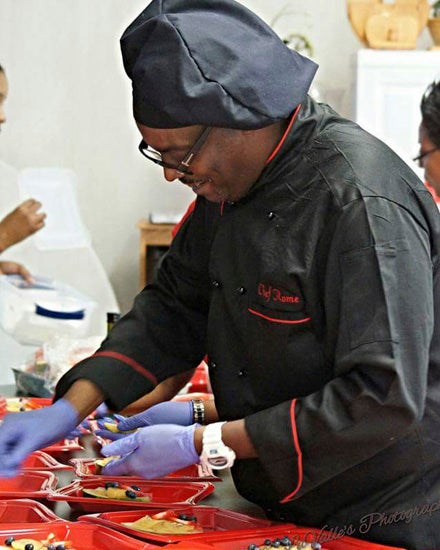 COOKING PARTNER: Chef Jerome Smallwood shows off his skills at the “Majestic Dining” Sip and Serve last month.
