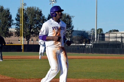 Dwanya Williams-Sutton safely halts at third base during a game last season. The sophomore was one of ECU’s most reliable offensive weapons.